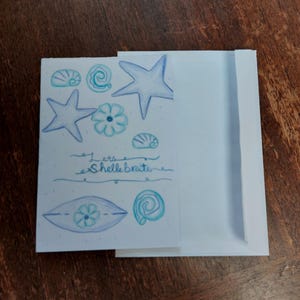 Cartão de felicitações desenhado à mão. Cartão de saudação azul.