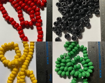 1/0 Rasta Röd Gul Grön Svart 6,5 mm Kråkapärla UPICK