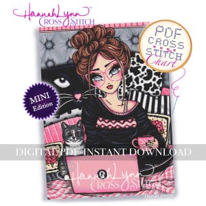 May include: A digital PDF cross stitch chart featuring a cartoon woman with pink glasses, a black top, and a pink laptop. The image includes a black cat, a gray cat, and the text "Hannah Lynn Cross Stitch". A "Mini Edition" badge is also visible.