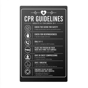 May include: A black rectangular CPR guidelines sign for adults and children 8 plus. It features white text and icons detailing steps including checking the scene, responsiveness, calling 9-1-1, chest compressions at least 2 inches deep, and breaths.