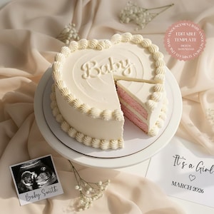 May include: A heart-shaped cake with white frosting and the word "Baby" on top. A slice is cut, revealing pink layers. An ultrasound photo and a card that says "It's a Girl!" are also present.