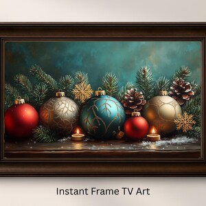 May include: A framed digital art print featuring Christmas ornaments, pinecones, and candles. The ornaments are red, gold, and teal, with snowflake accents. The text "Instant Frame TV Art" is at the bottom of the frame.