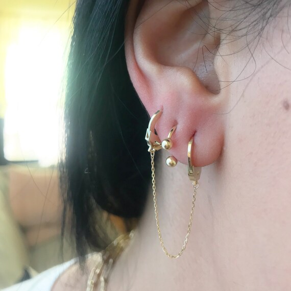 Gold handcuff sales earrings