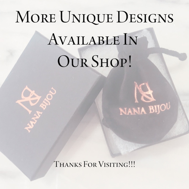 May include: A black box with the text "NANA BIJOU" in gold lettering. A black velvet bag with the same text in gold lettering is sitting on top of the box. The text "MORE UNIQUE DESIGNS AVAILABLE IN OUR SHOP! THANKS FOR VISITING!!!" is written in white text on a white background.
