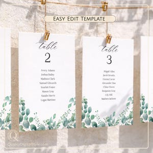 May include: White wedding table cards with eucalyptus leaf design, featuring table numbers 2 and 3. Each card displays guest names. The text "EASY EDIT TEMPLATE" is at the top. The bottom of the card has the text "QualityDigitalStyle.com".