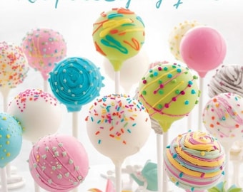 May include: A collection of colorful cake pops on white sticks, decorated with sprinkles, frosting, and various designs. The image includes the text "BEGINNER'S CAKE POP Recipe & Styling Guide" in pink and blue, suggesting a tutorial or guide for making and decorating cake pops.
