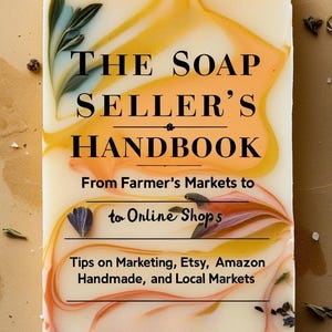 May include: A rectangular bar of soap with a creamy white base and swirls of yellow, orange, and pink. The text "THE SOAP SELLER'S HANDBOOK" is displayed, along with tips on marketing and online shops.