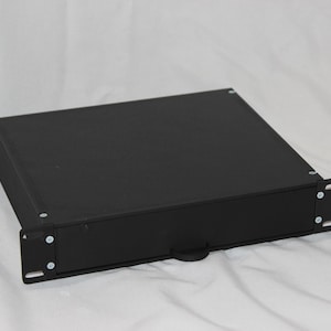 May include: A black metal drawer slide with a pull handle. The drawer slide is designed to be mounted to a shelf or rack.