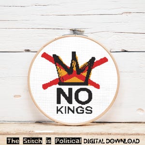 May include: A cross-stitch embroidery in a wooden hoop features a red and yellow crown with a red line through it, and the words "NO KINGS" in black. The text "The Stitch is Political DIGITAL DOWNLOAD" is at the bottom.
