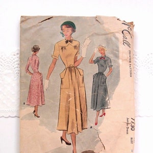May include: Vintage McCall's sewing pattern for a junior dress, pattern number 7130, bust size 32, price 50 cents. The pattern shows three women wearing different versions of the dress.