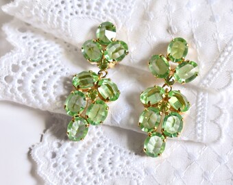 vintage Signed Schreiner Peridot Lime Green Rhinestone Clip Earrings dangle drop inverted faceted oval stones -- beautiful!