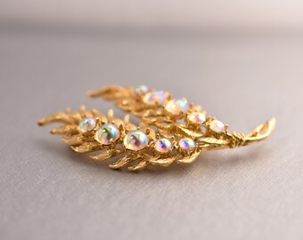 Vintage Golden Feather Leaf Brooch Pin with Jeweled Iridescent AB Rainbow Cabochon Stones unsigned designer