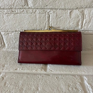 Cartera Prince Gardner vintage burdeos de los años 70 NUEVA