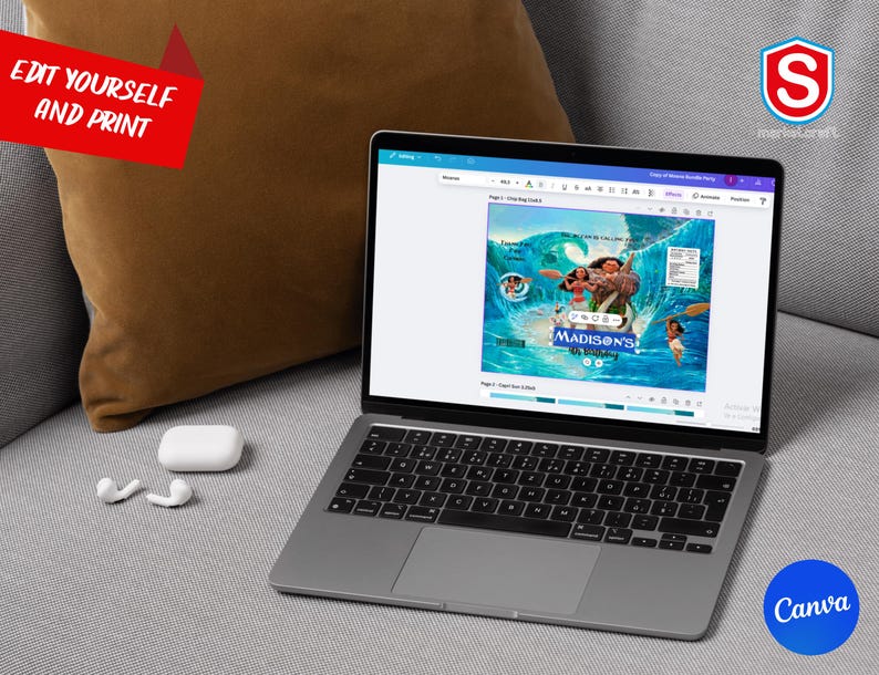 May include: A laptop displaying a colorful digital design with the text "Madison's". The laptop is open on a gray couch next to a brown pillow and white earbuds. The words "Edit Yourself and Print" are in a red banner.