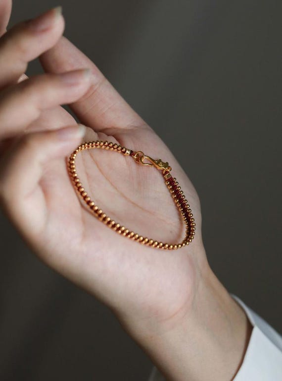 Braccialetto di coppia in corda rossa intrecciata con ciondolo in