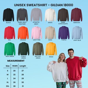 May include: A variety of Gildan 18000 unisex sweatshirts in various colors, including black, red, and gold. The image displays a measurement chart with sizes ranging from S to 2XL, with width measurements from 20 to 28 inches and lengths from 27 to 31 inches.