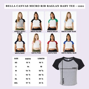 May include: A Bella + Canvas Micro Rib Raglan Baby Tee in various color combinations, including white with black, navy, pink, and red sleeves. Sizes range from XS to 2XL, with chest widths from 13 1/4 to 17 3/4 inches and lengths from 18 1/2 to 21 7/8 inches.