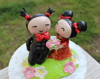 Custom handmade Clay Pucca and Garu Wedding Cake Topper with base