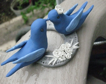 Blue Kissing Love Birds on a horseshoe