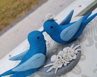 Blue kissing love bird clay cake topper