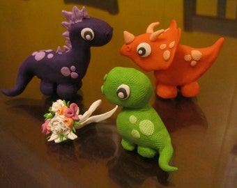 Customized dinosaurs family  cake toppers