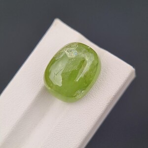 Peridot 17.79 Ct Oval Cabochon – Natural Green Loose Gemstone from Pakistan