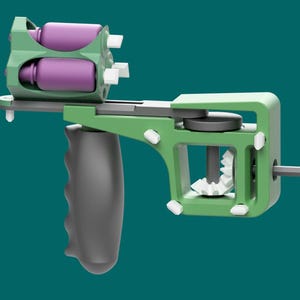 May include: A green and purple mechanical device with a grey handle. The device has a complex design with multiple components, including cylinders, gears, and levers. The handle is ergonomically shaped for gripping.