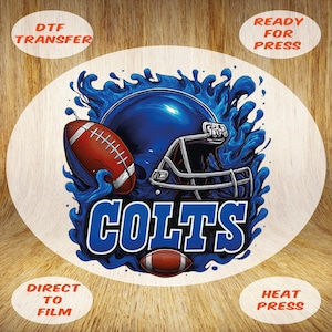 May include: DTF transfer design featuring a football helmet, two footballs, and the word "COLTS" in blue. The design is surrounded by blue water-like swirls. The words "DTF TRANSFER", "READY FOR PRESS", "DIRECT TO FILM", and "HEAT PRESS" are also present.