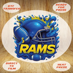May include: DTF transfer featuring a blue football helmet, football, and the word "RAMS" in yellow. The design includes blue and yellow water-like elements. The text "DTF TRANSFER", "READY FOR PRESS", "DIRECT TO FILM", and "HEAT PRESS" are also present.