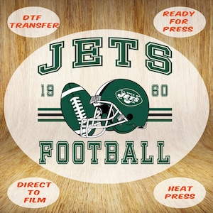 May include: A green and white football design featuring a football, helmet, and the word "JETS" in bold, block letters. The design includes the words "FOOTBALL", "19", and "60". The design is ready for heat press.