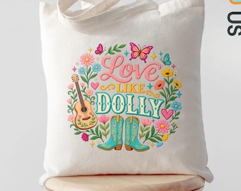 May include: A white canvas tote bag featuring a colourful graphic print of a guitar, two cowboy boots, butterflies, and flowers. The text reads Love LIKE DOLLY in a decorative font. The design is surrounded by green leaves and small pink hearts.