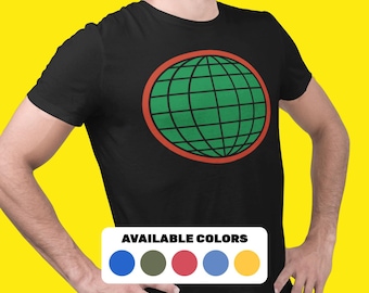 May include: A black short-sleeved t-shirt featuring a graphic of a green globe with black grid lines enclosed in a red circular border. Below the graphic, a white rectangular label displays the text AVAILABLE COLORS with five circles.