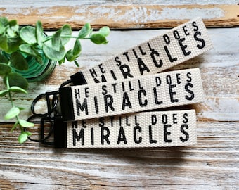 He still does miracles canvas keychain wristlet