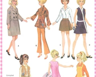 May include: A vintage sewing pattern illustration featuring seven figures labelled A through G, showcasing various outfits including coats, jackets, skirts, dresses, and aprons in diverse colours, with text reading Compiled & Digitised by Aussie Sewing & Crafts.