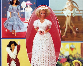 May include: A collection of five fashion dolls wearing various crocheted outfits. One doll wears a blue dress with a matching hat and purse, another a white wedding gown with a veil, a third a peach ballet outfit, a fourth a red coat with white trim, and the fifth a yellow hat with a striped poncho and purple trousers.
