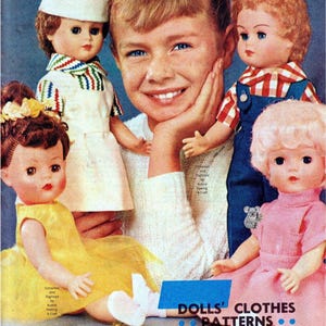 May include: Vintage image featuring a young girl surrounded by four dolls. The dolls are dressed in various outfits, including a chef's uniform, overalls, and a pink dress. The image also includes the text "DOLLS' CLOTHES PATTERNS".