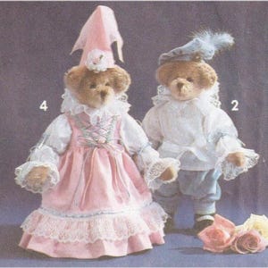 May include: A white ceramic mug with a black handle and the text "But First, Coffee" in a black, bold font. The mug is sitting on a white surface. The mug is likely used for hot beverages.