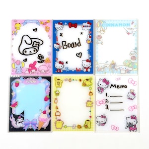 May include: Six clear, rectangular memo boards with colorful character designs. Each board features a different theme, including Hello Kitty, My Melody, and Cinnamoroll. Some boards have the words "Board" and "Memo" printed on them.