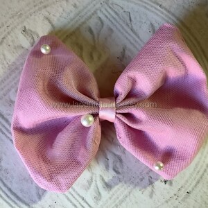 Girls blush pearl accented elegant hairbow