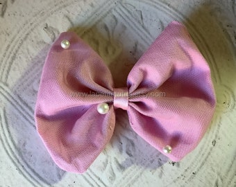 Girls blush pearl accented elegant hairbow