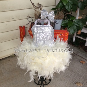 Silver sequin girls feather dress with matching bow