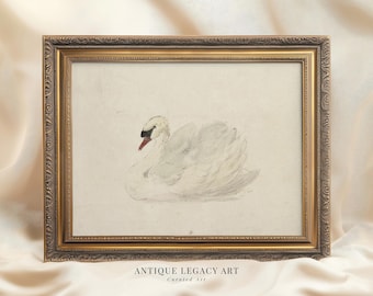 May include: A framed watercolor painting of a white swan with a red beak. The artwork is in a gold ornate frame. The text "ANTIQUE LEGACY ART Curated Art" is at the bottom of the image.
