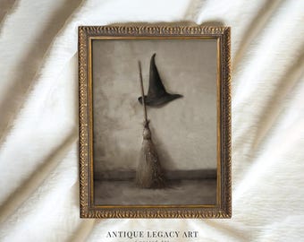 May include: An antique-style framed print featuring a witch's hat and broom. The artwork is in muted tones of gray and brown, with a gold-colored ornate frame. The text "ANTIQUE LEGACY ART" is visible at the bottom of the frame.