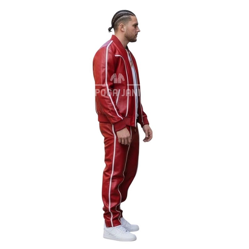 May include: A red leather tracksuit with white stripes. The jacket has a zipper closure and the pants have a straight leg design. The outfit is worn with white sneakers.