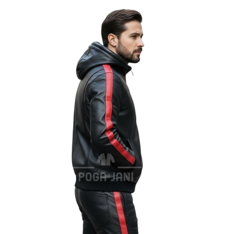 May include: Black leather jacket with a red stripe down the sleeves. The jacket has a hood and a zipper closure. The text "POGA JANI" is printed on the bottom of the jacket.
