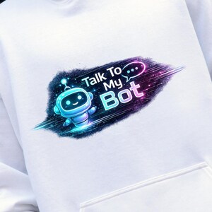 May include: White hoodie with a front pocket featuring a colorful graphic. The graphic includes a cartoon robot and the text "Talk To My Bot" in a futuristic design with blue, purple, and teal accents.