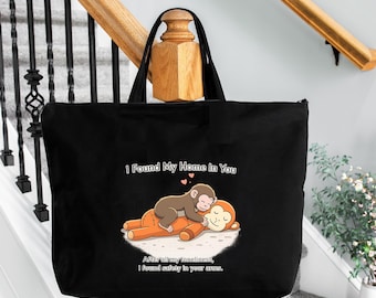 Bolso de mano Monkey Love: Bolso de lona cómodo con la frase "Encontré mi hogar en ti".