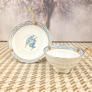Vintage Paragon Blue Bird Teacup and Saucer: Fine Bone China Collectible