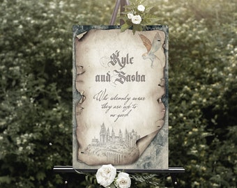 May include: A wedding sign with a vintage parchment background, featuring the names "Kyle and Sasha" in calligraphy. The sign also includes a drawing of a castle and the text "We solemnly swear they are up to no good."