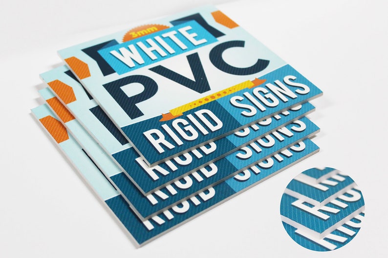 May include: Stack of four 3mm white PVC rigid signs. Each sign has a blue and white patterned background with the text "RIGID SIGNS" in white. The top sign also has the text "3mm WHITE PVC" in black and orange.